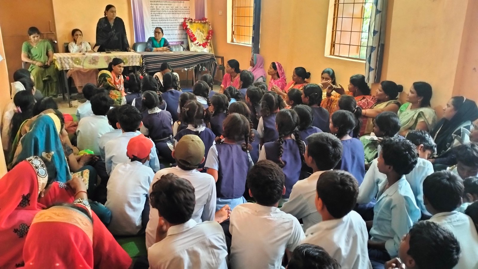 School awareness programme — community meeting with children